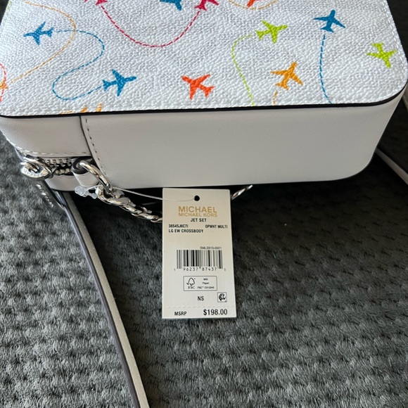 Michael Kors Jet Set WHITE Multi Airplane Print East West Crossbody Bag NEW - Picture 3 of 5
